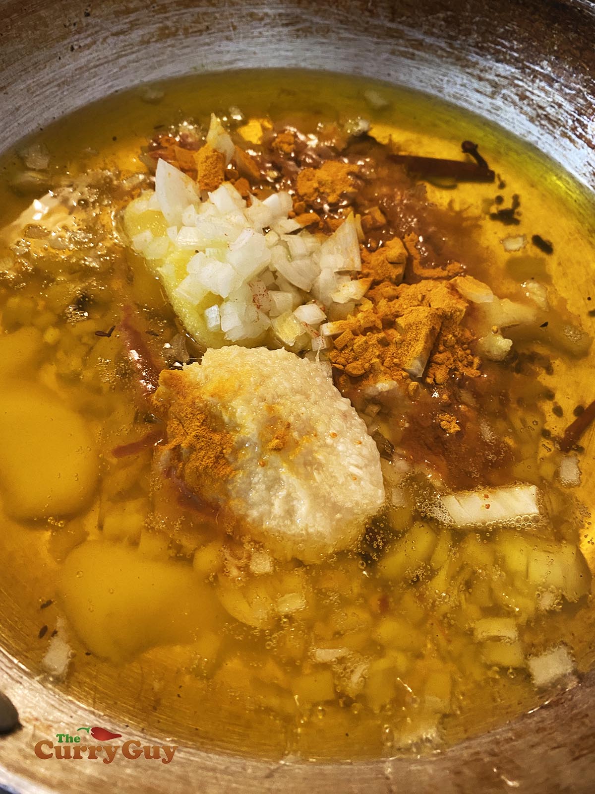 Stirring in the garlic, shallots and all the remaining ingredients. 