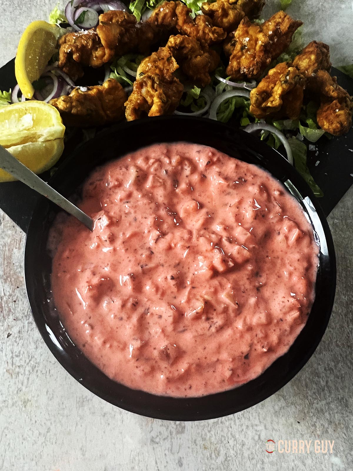 Pakora sauce served with chicken pakoras.