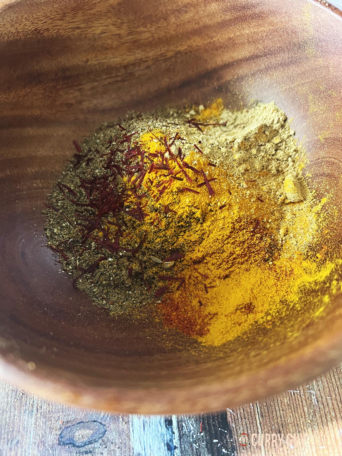String the ground spices into the spice blend.