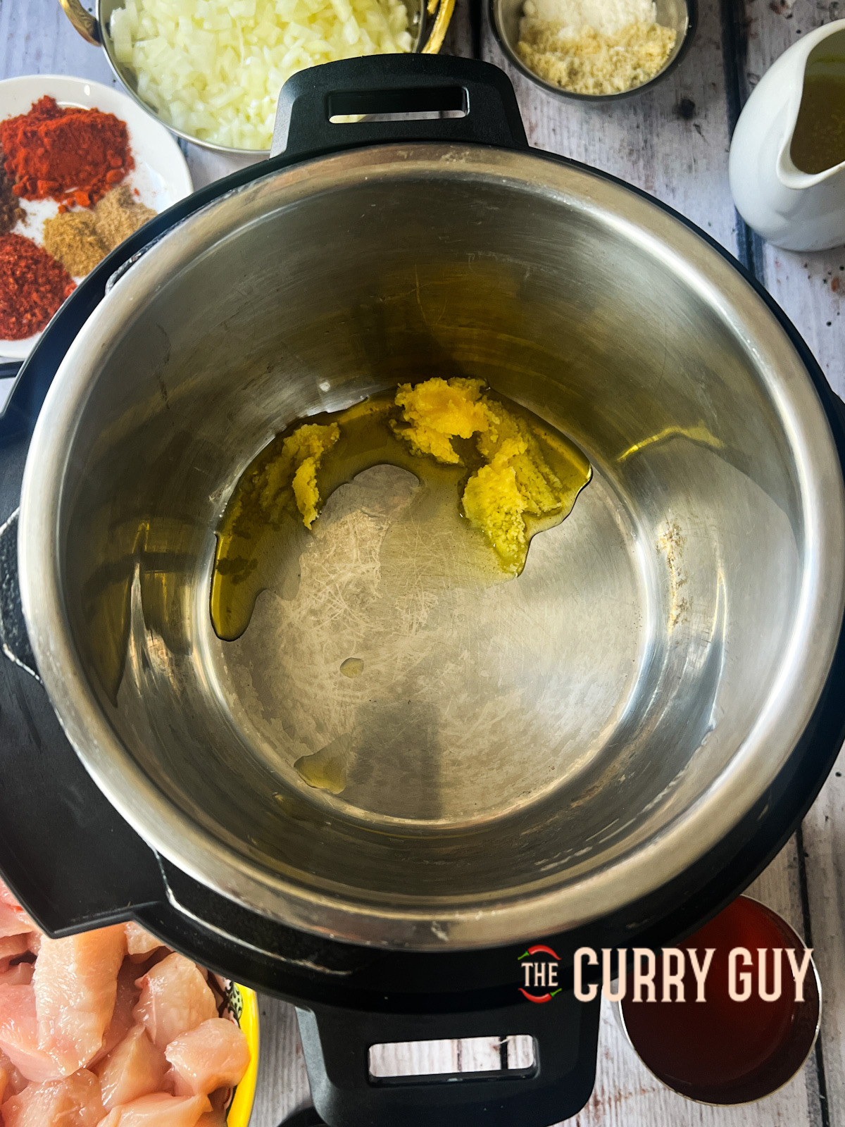 Ghee melting in slow cooker.