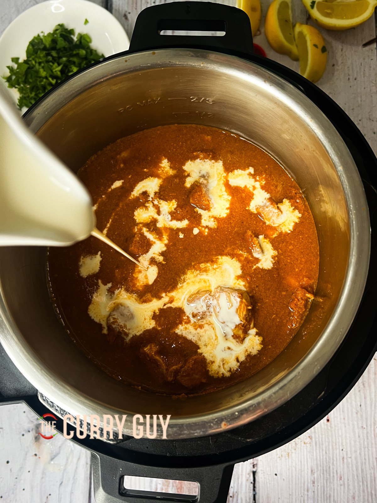 adding cream to the nearly finished dish