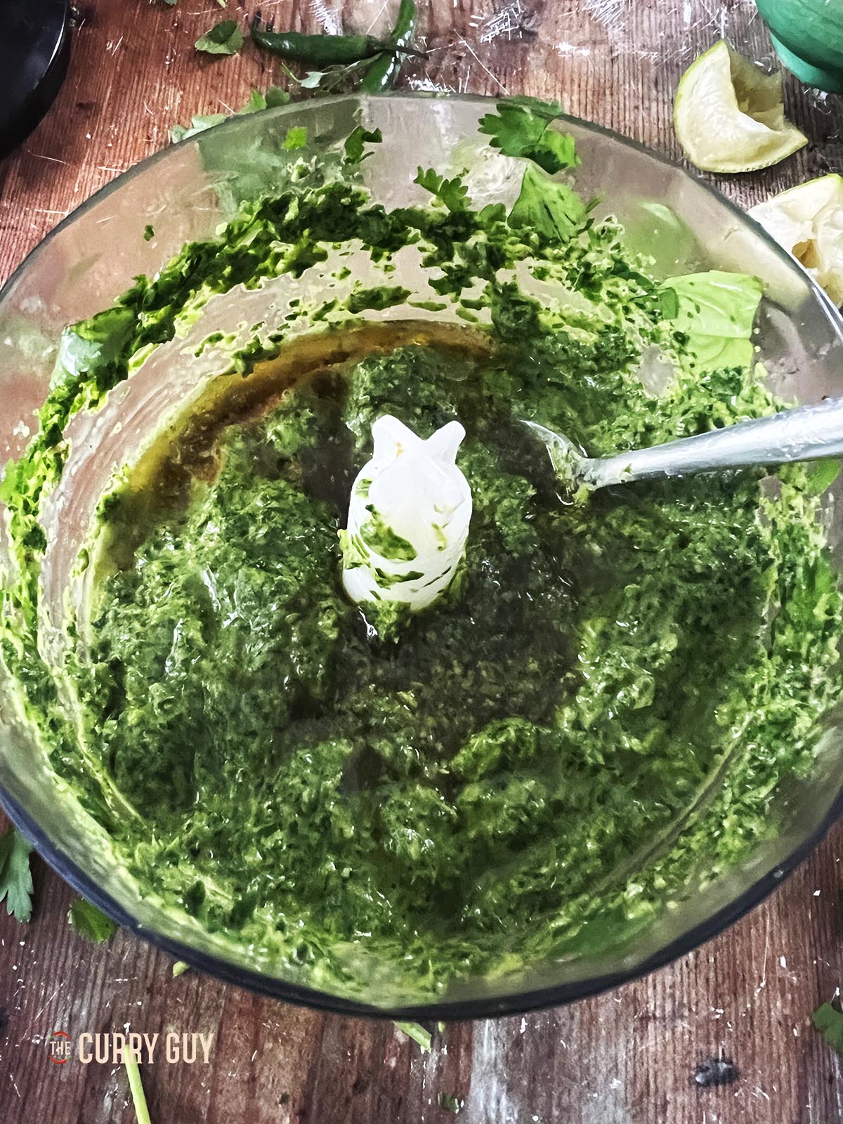 Adding more soy sauce and fish sauce to the Asian chimichurri sauce.