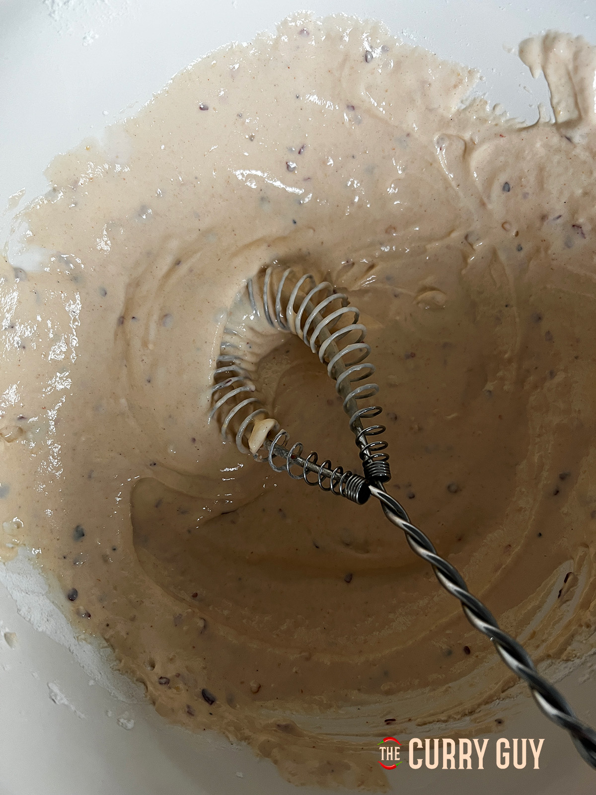 Batter ingredients whisked in a bowl