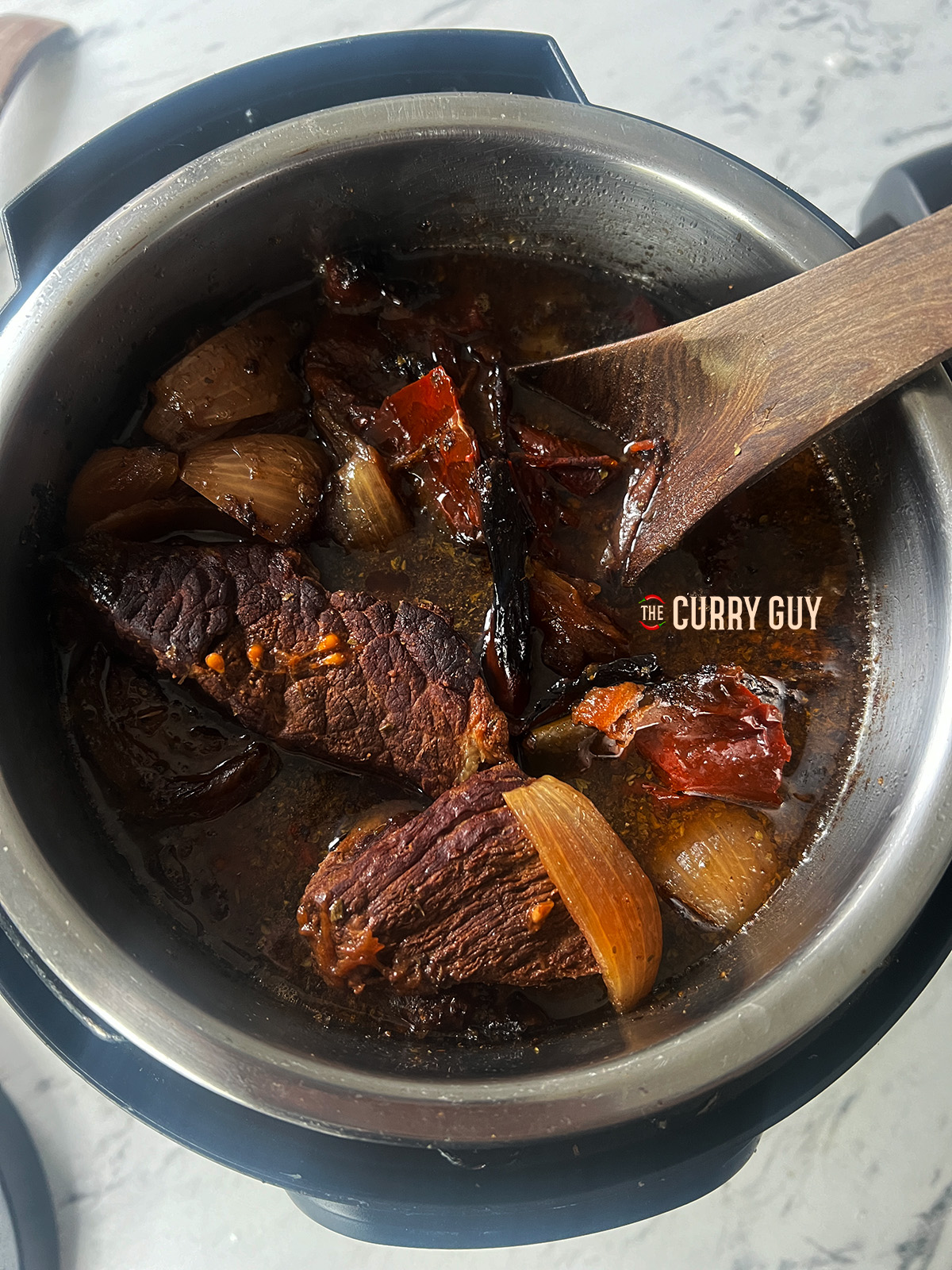 finished cooking crock pot birria tacos 