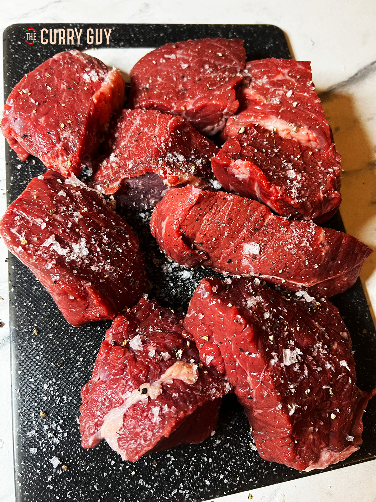 salt and peper on beef