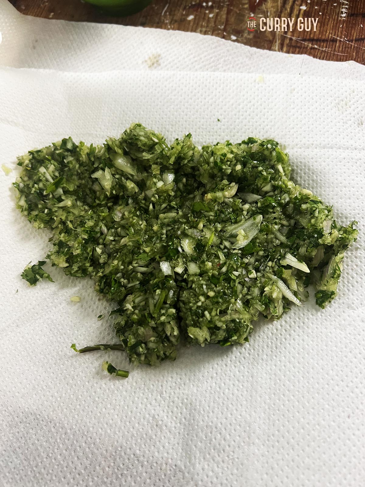 The finely chopped garlic, ginger, shallots, coriander (cilantro) and parsley.