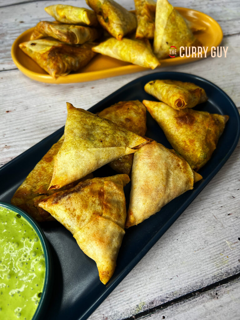 air fryer samosas on a plate.