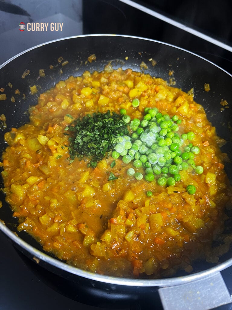 Fresh herbs added to the pan 