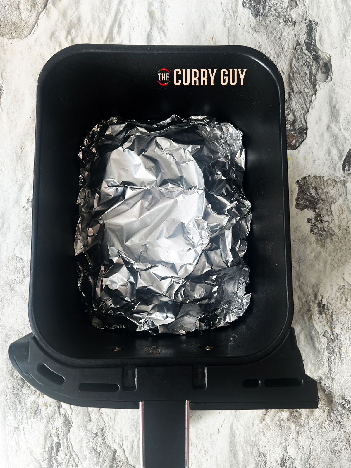 covered chicken in foil