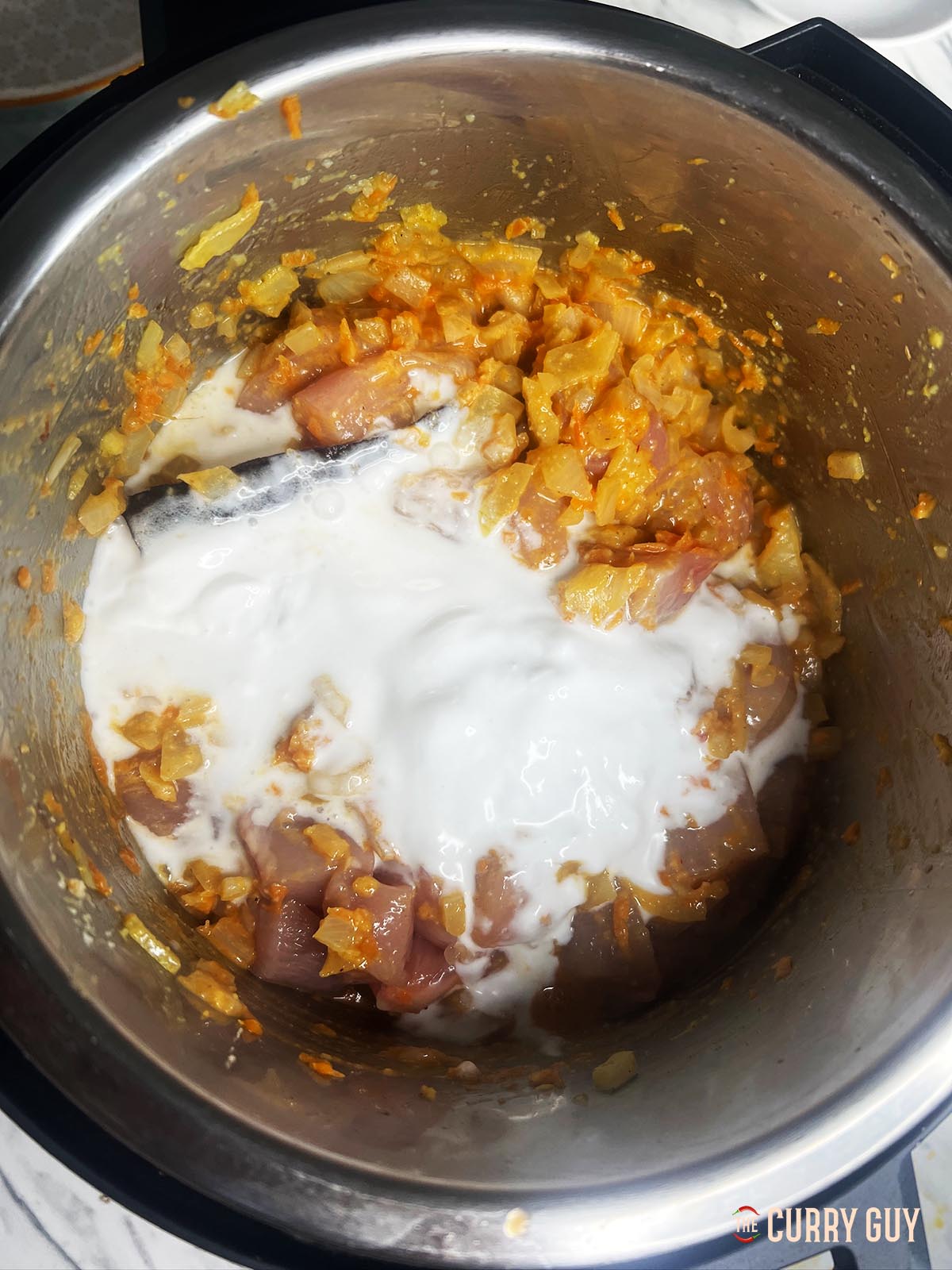 Coconut milk in slow cooker for curry