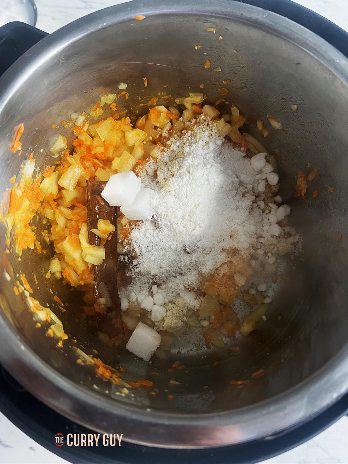 spices added to the chicken korma in the slow cooker