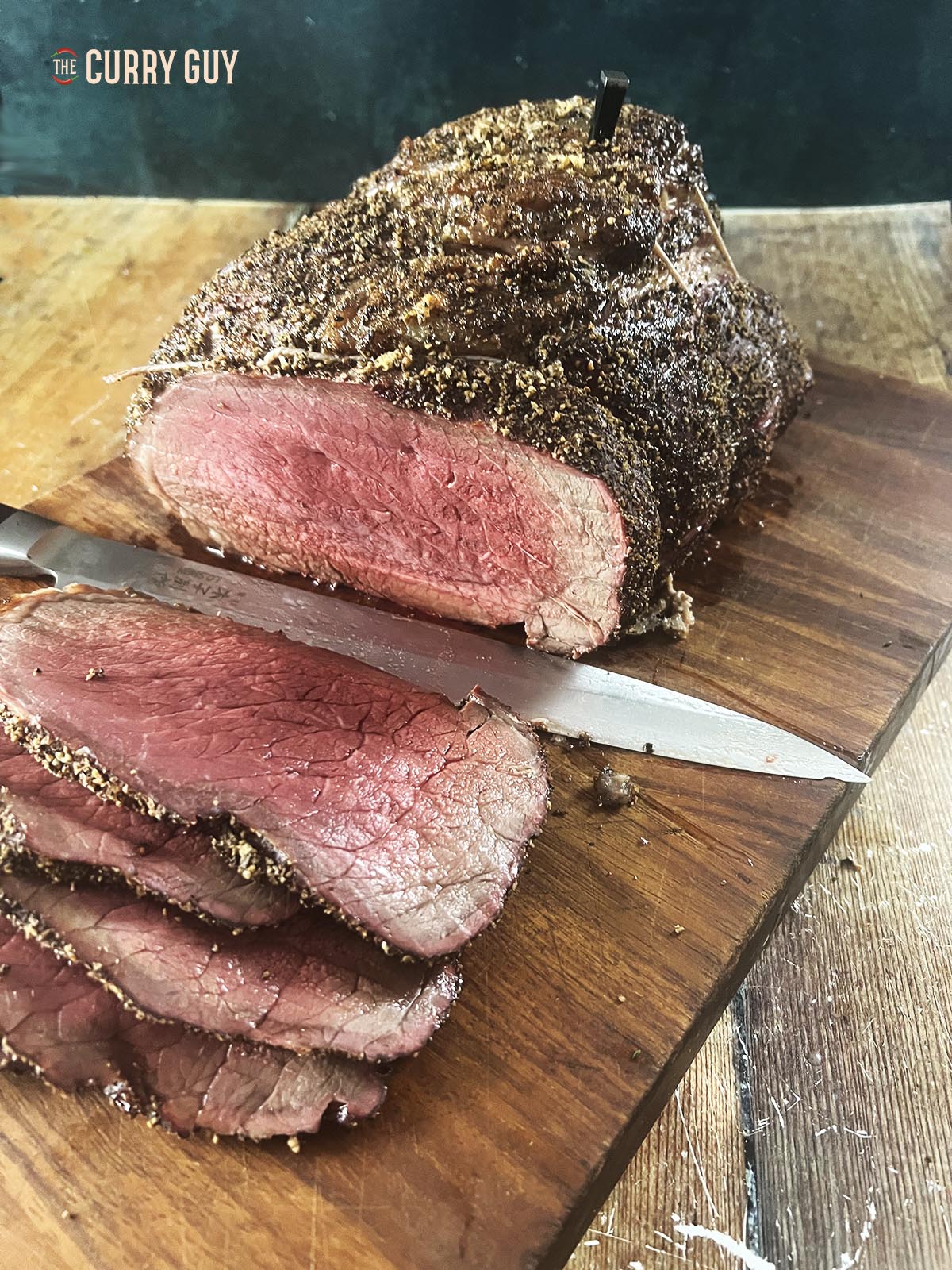 Slicing the top round into this slices against the grain.
