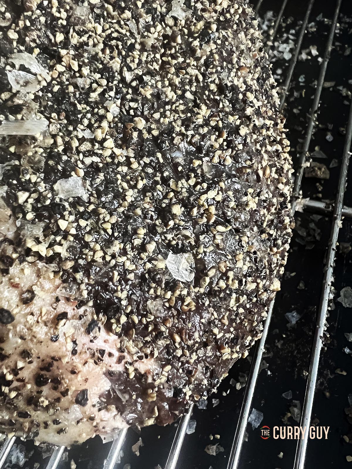 Moisture coming out of the meat after salting.