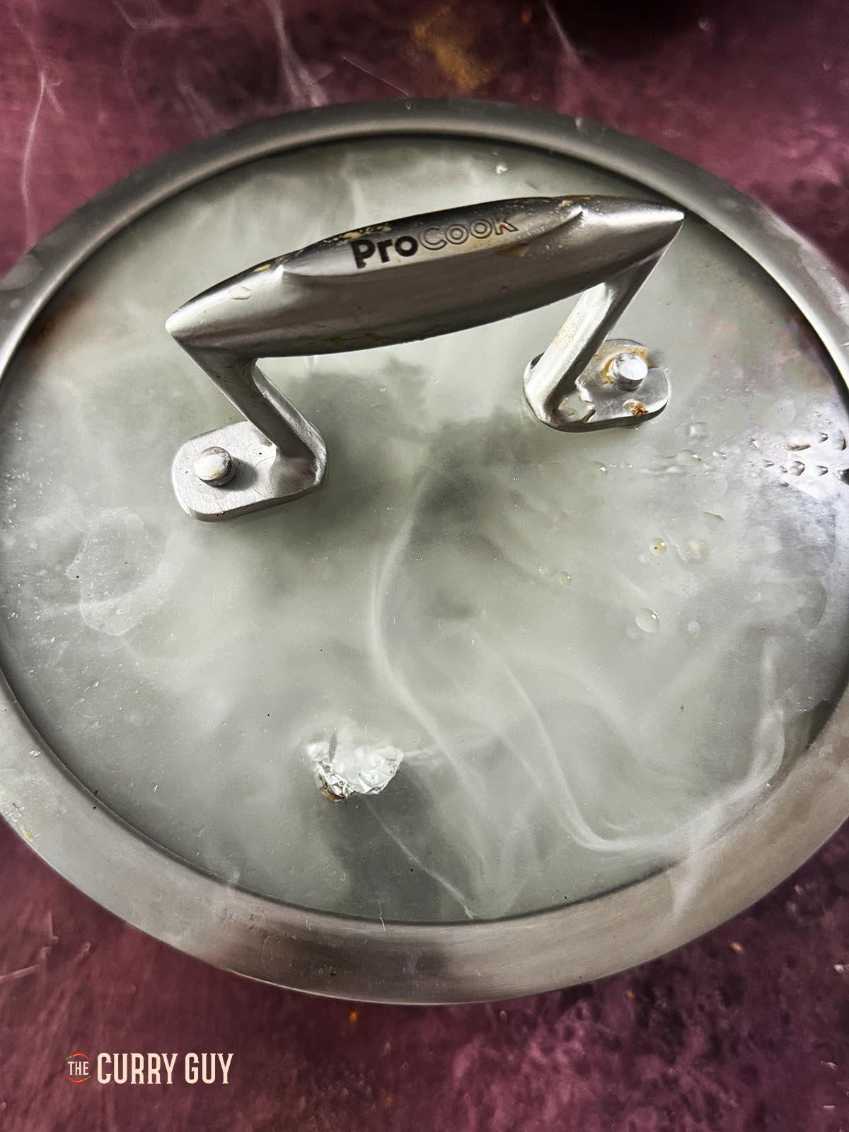 The charcoal smoking the lamb chops.