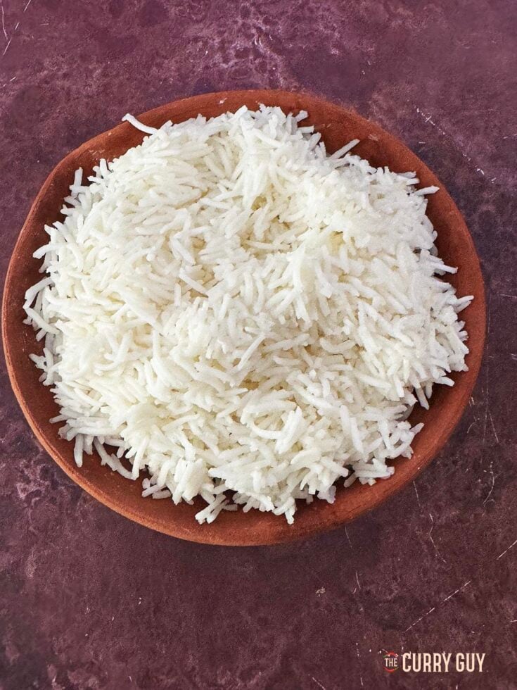 Air Fryer Rice - Fluffy Basmati rice in a serving bowl.