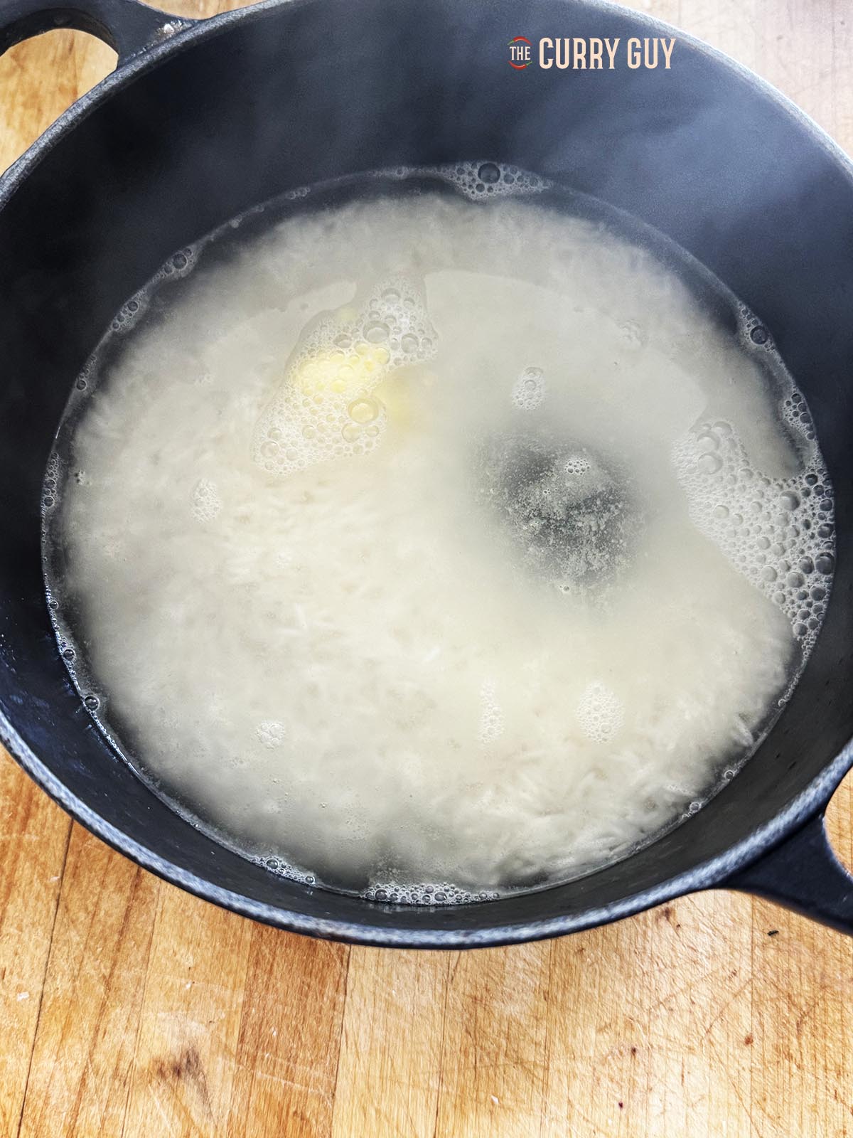 The rice covered with boiling hot water. 