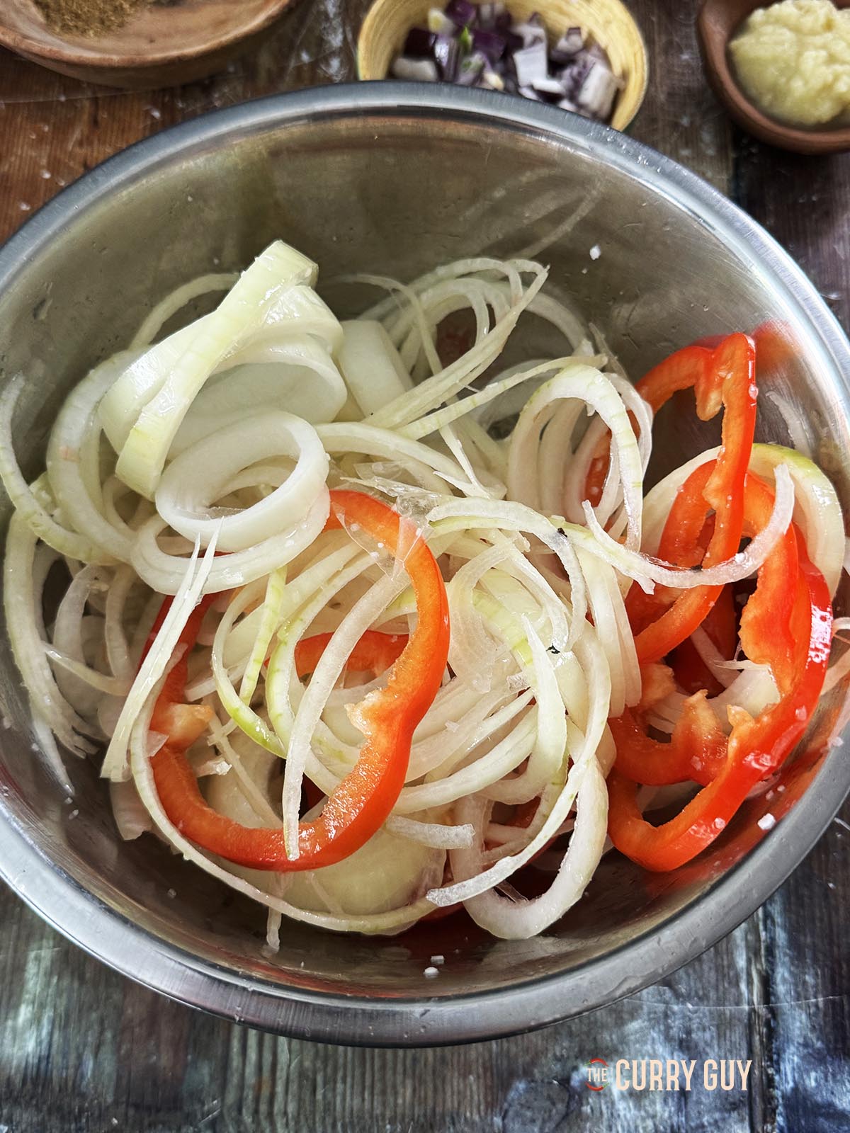 Preparing the onions and bell pepper for air frying.