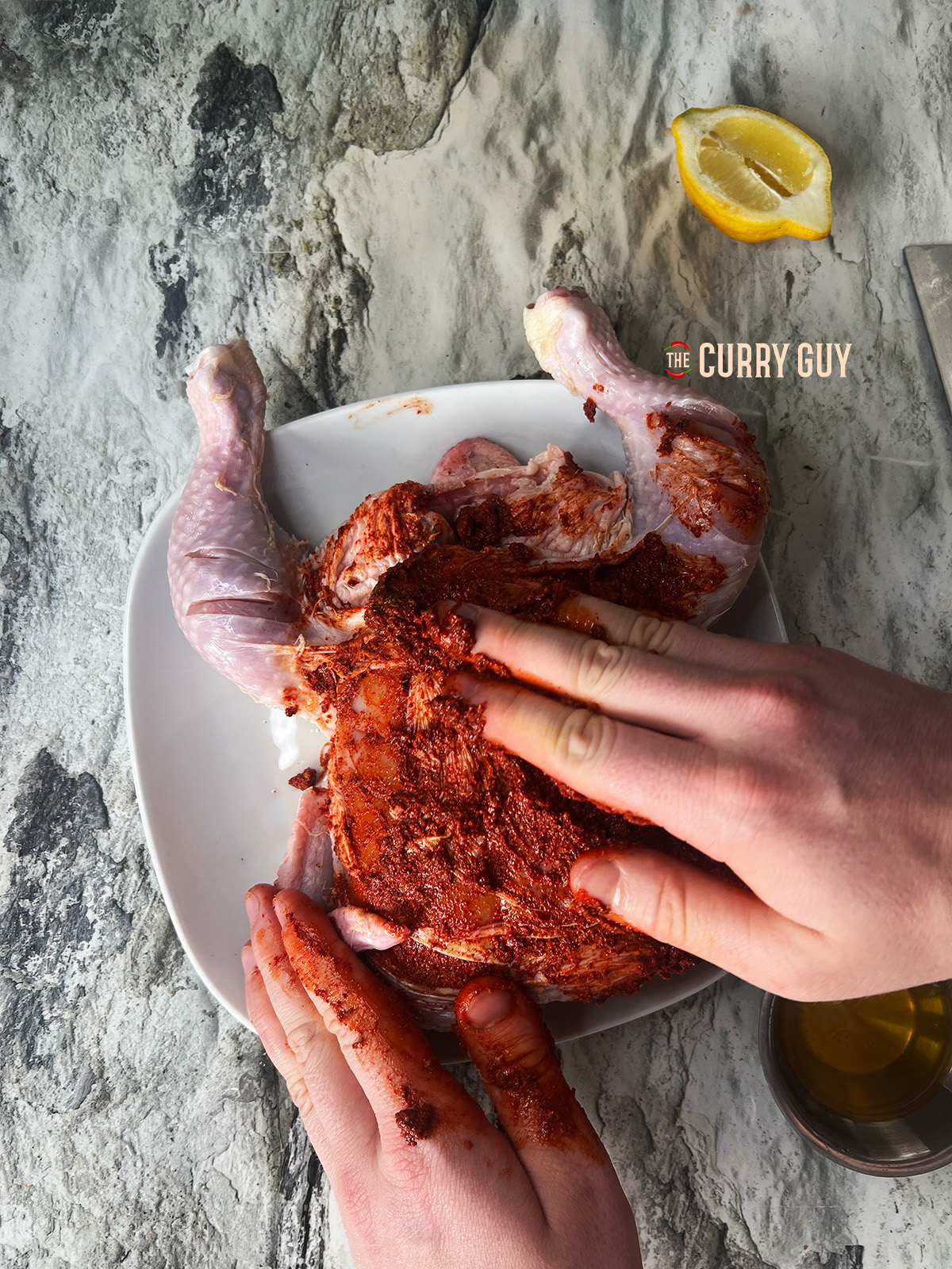 Adding marinade to the air fryer whole chicken 