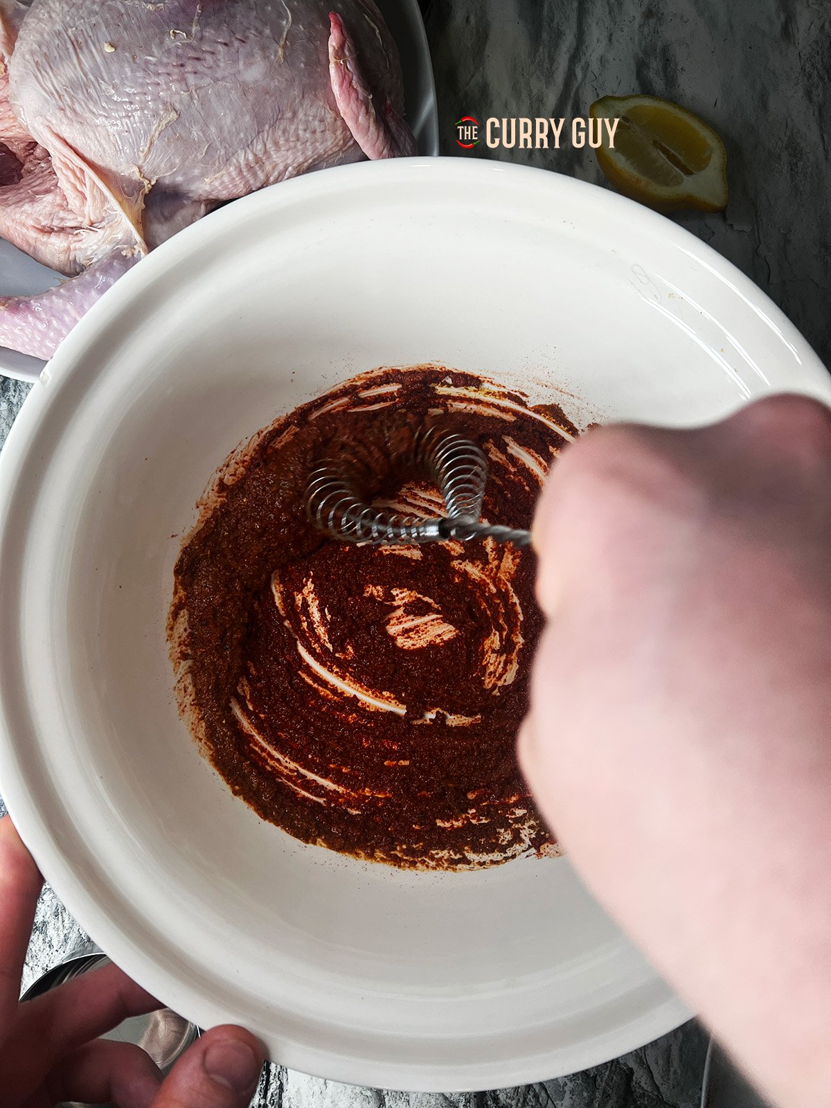 whisking marinade ingredients 