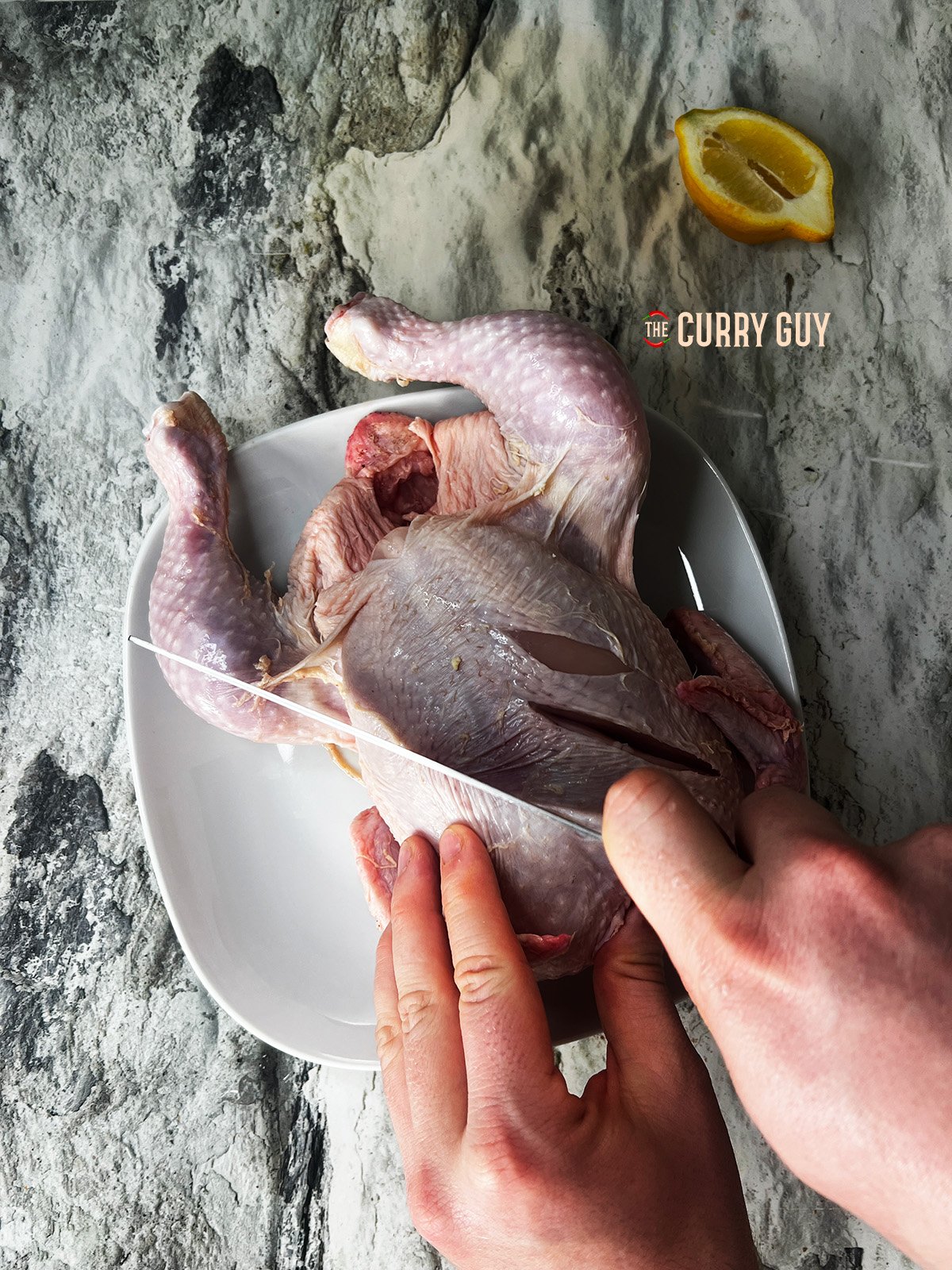 Scoring the chicken for the marinade