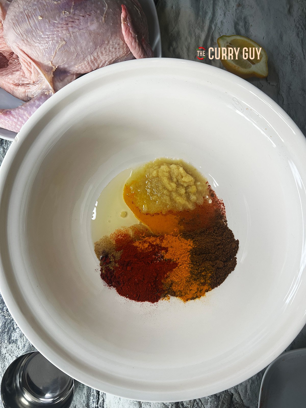 Marinade ingredients for Air Fryer Whole Chicken in a bowl. 