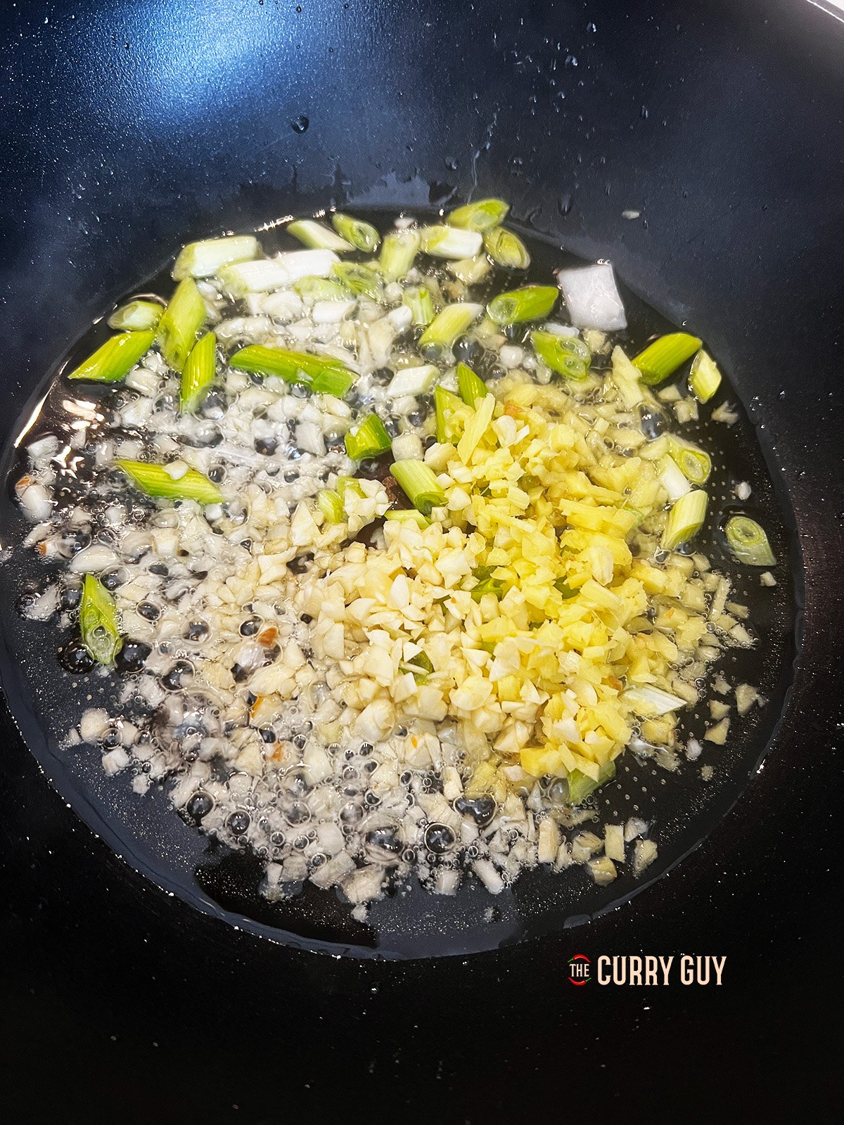 Frying the garlic, ginger and onions. 
