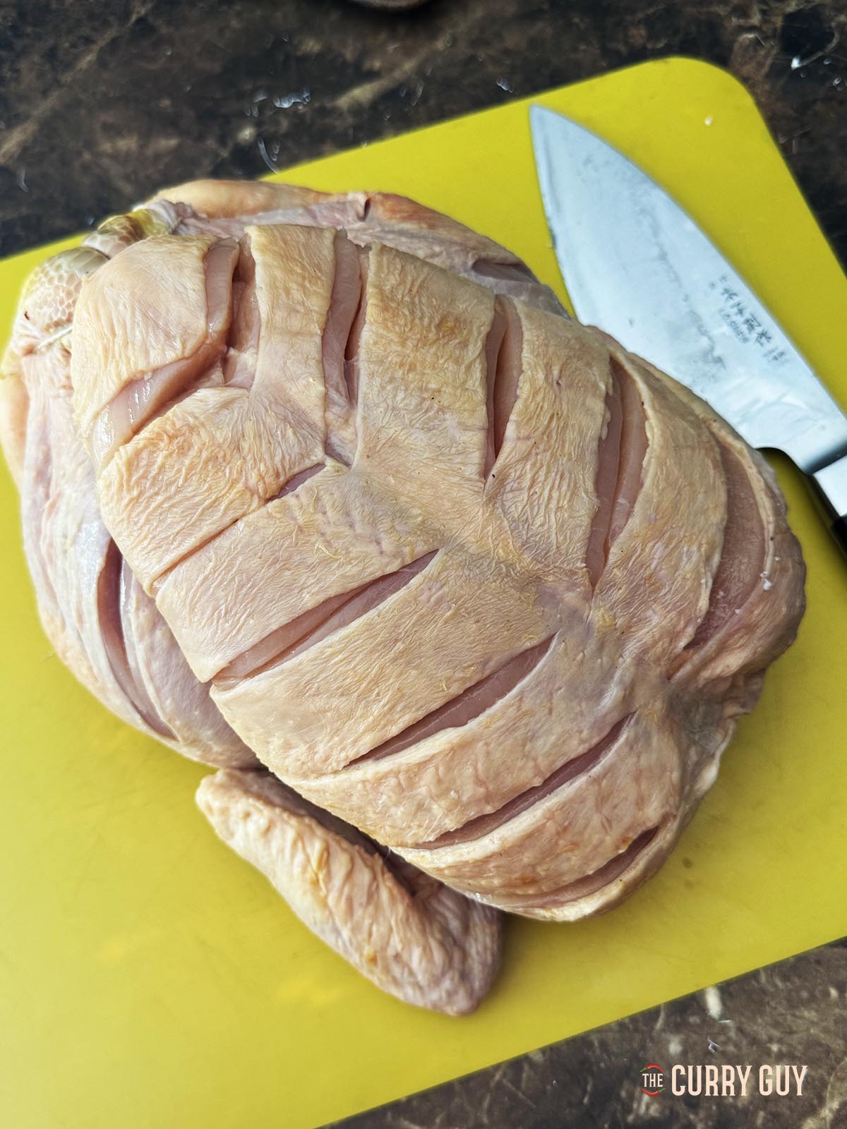 The chicken scored all over the breasts and thighs.