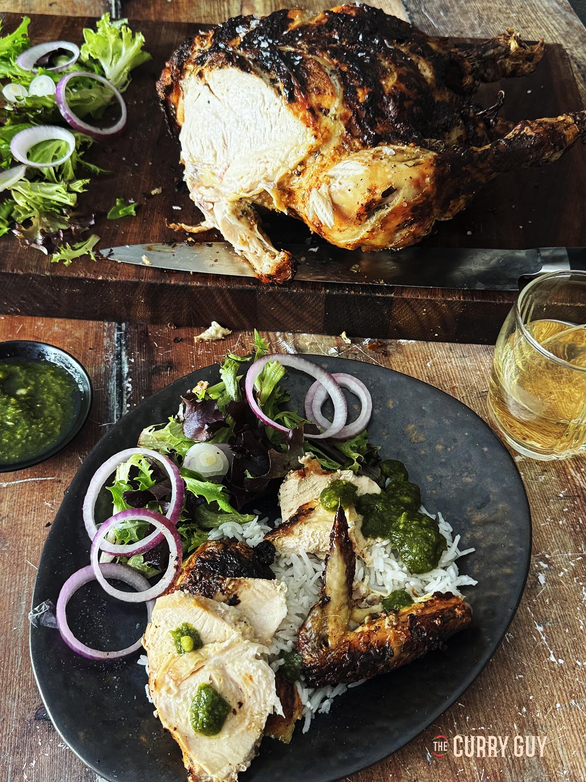 The chicken plated up with salad and chutney.