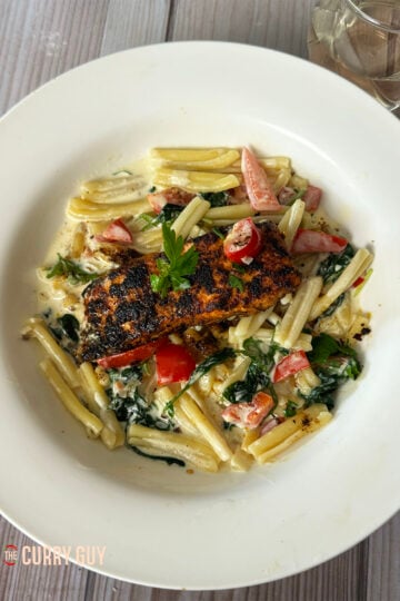 Cajun salmon pasta plated up.