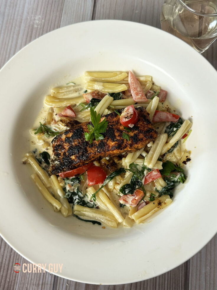 Cajun salmon pasta plated up.