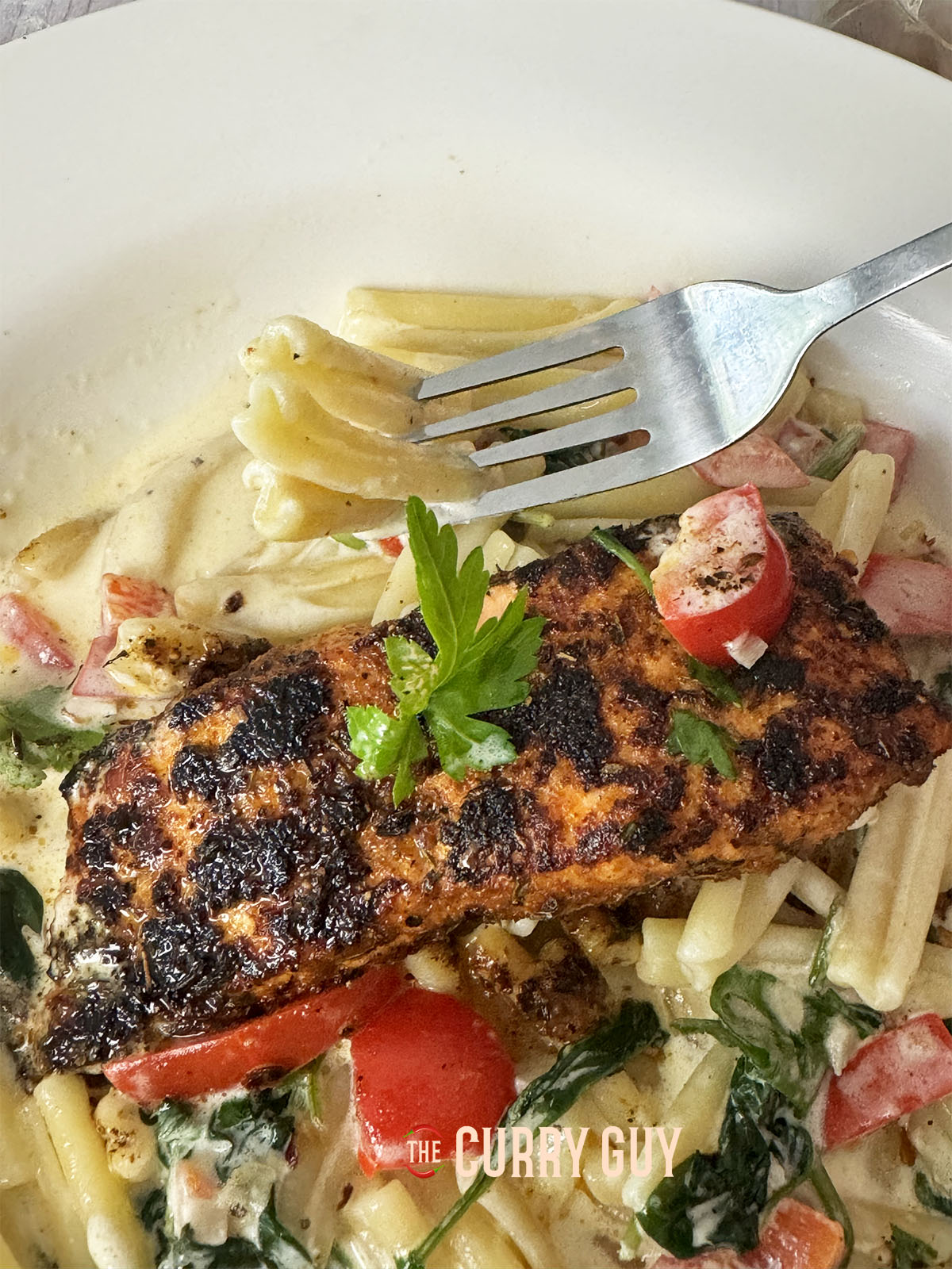 Cajun salmon pasta plated up.