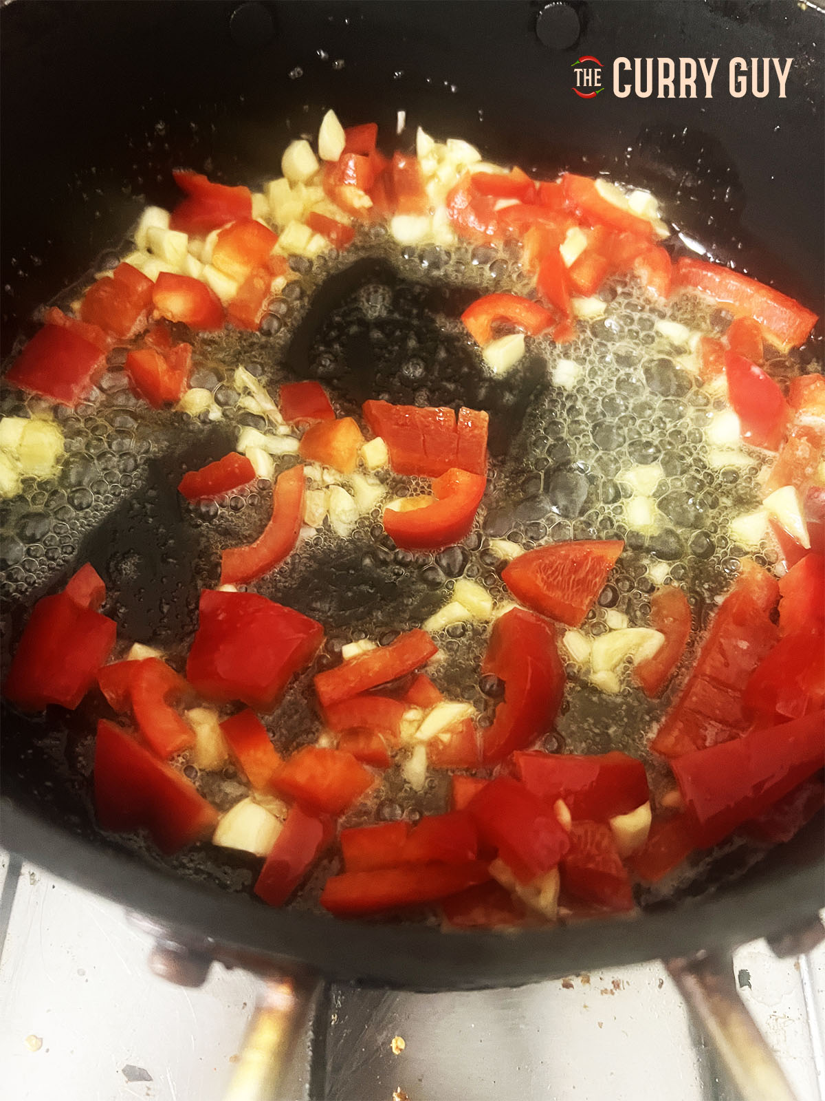 Red pepper and garlic frying.