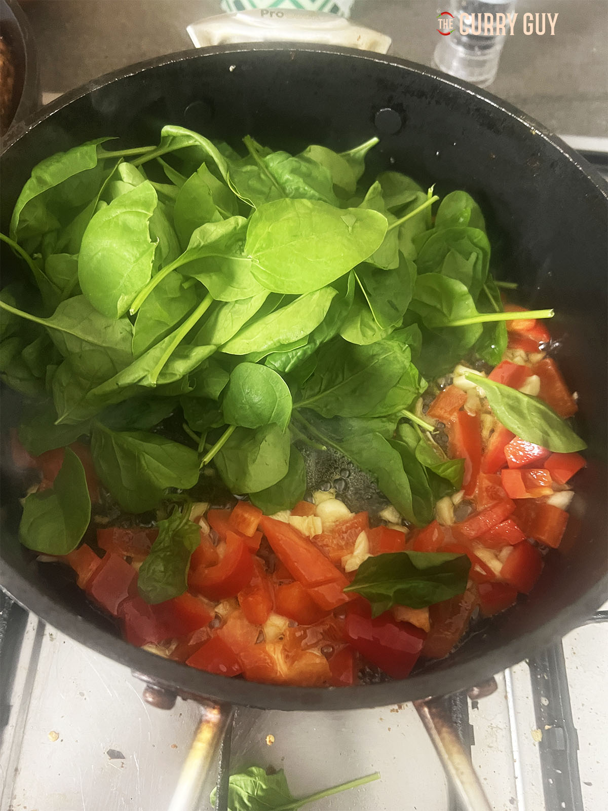Spinach added to pan.