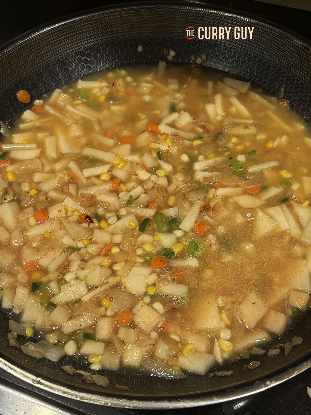 The stock has been poured in to the pan