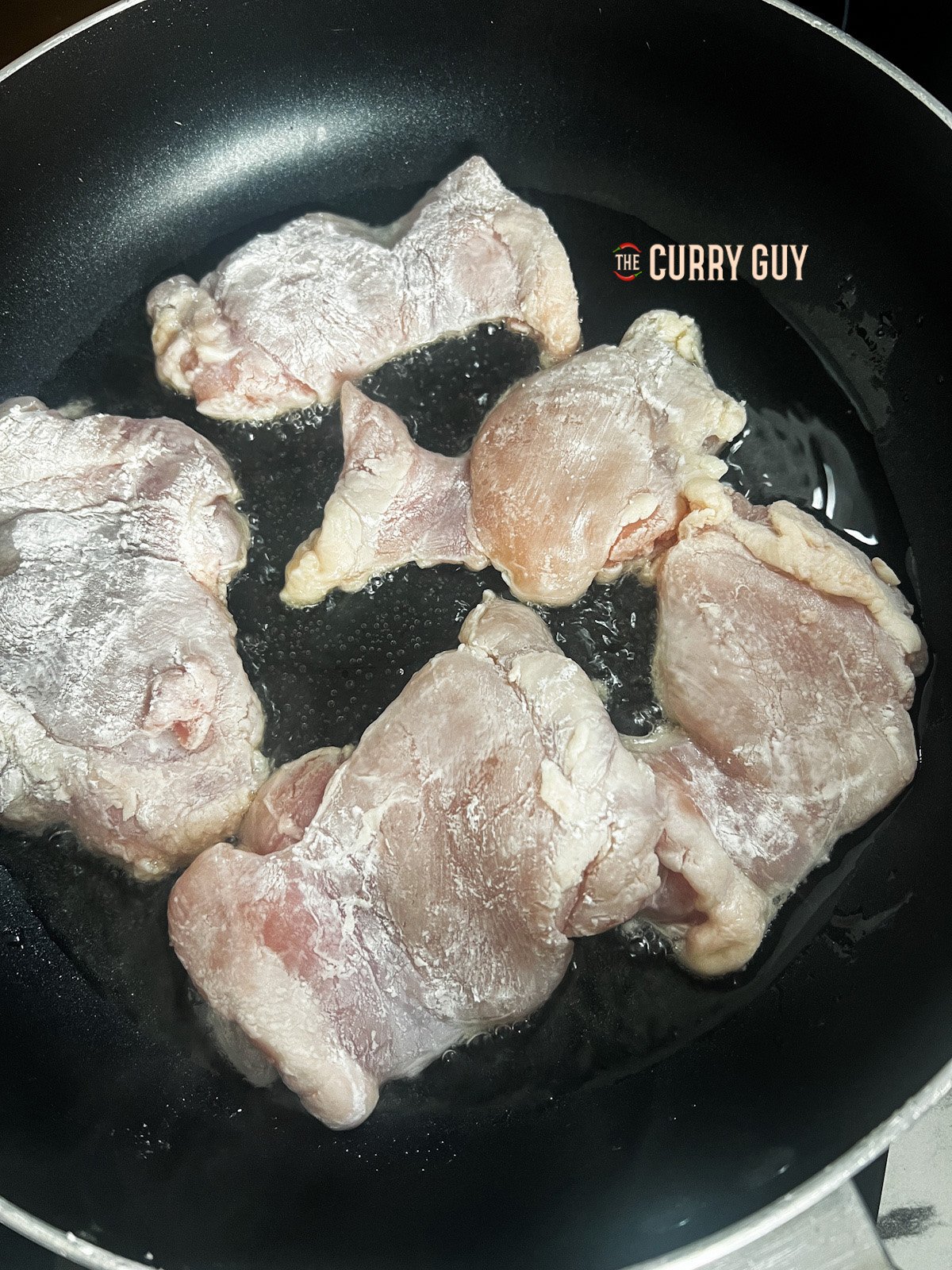 Recipe step - Chicken frying in a pan