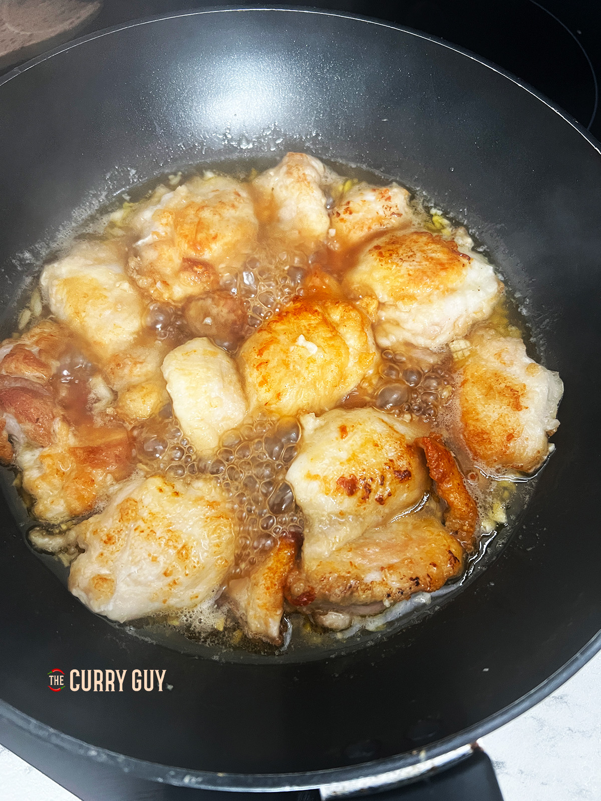 Combining all ingredients together in the pan for the final step. 