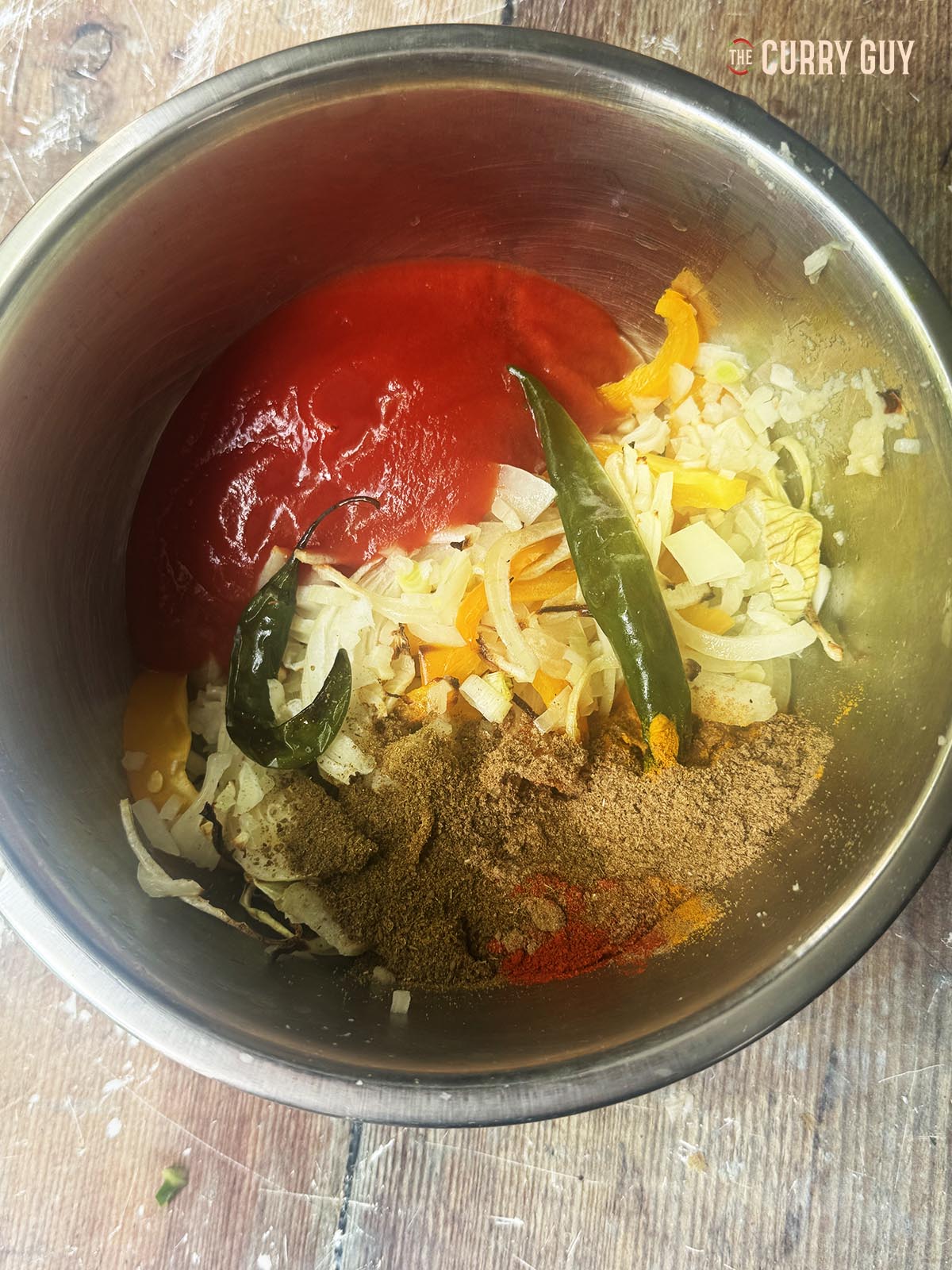 All of the sauce ingredients in a mixing bowl.