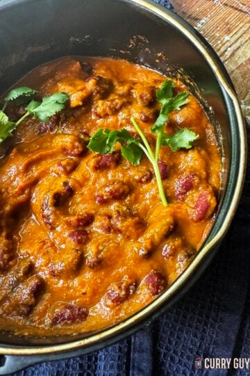 Kidney bean curry or 'rajma' served in an air fryer pan at the table.