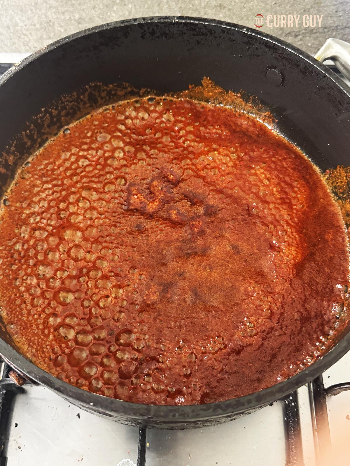 Bringing the butter sauce to a simmer.