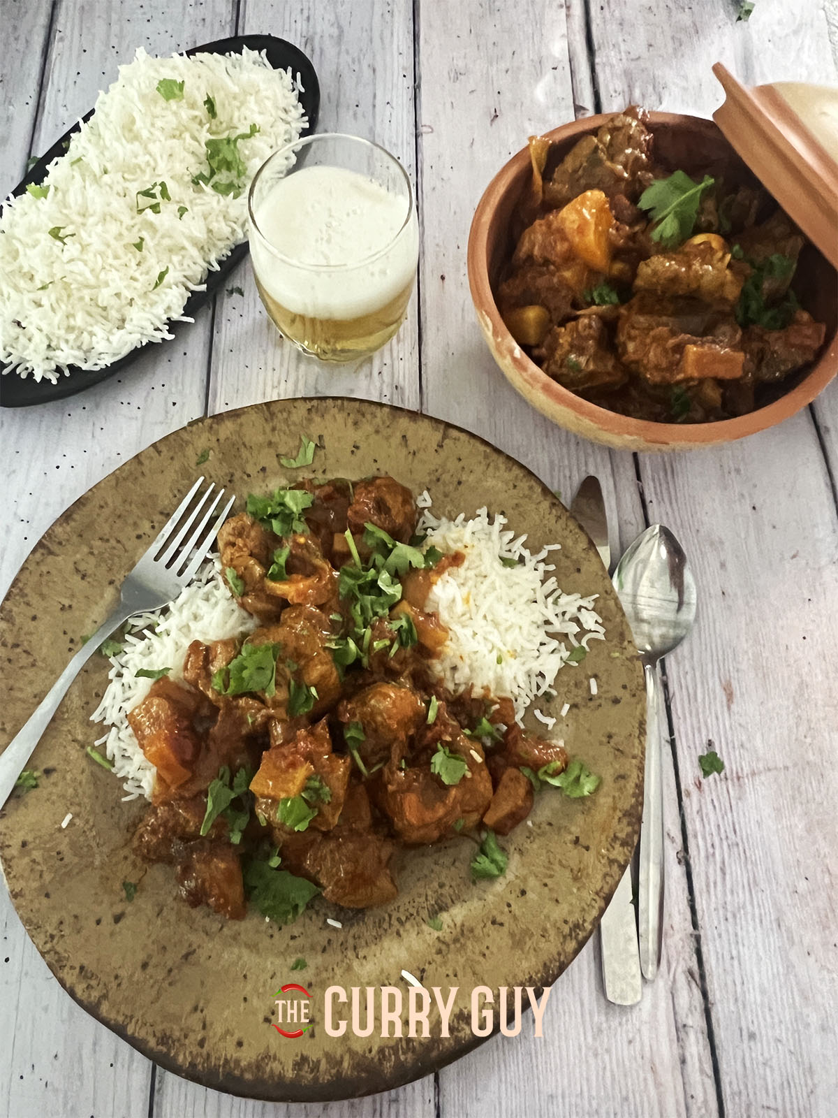 shalgam gosht served on a plate with rice.