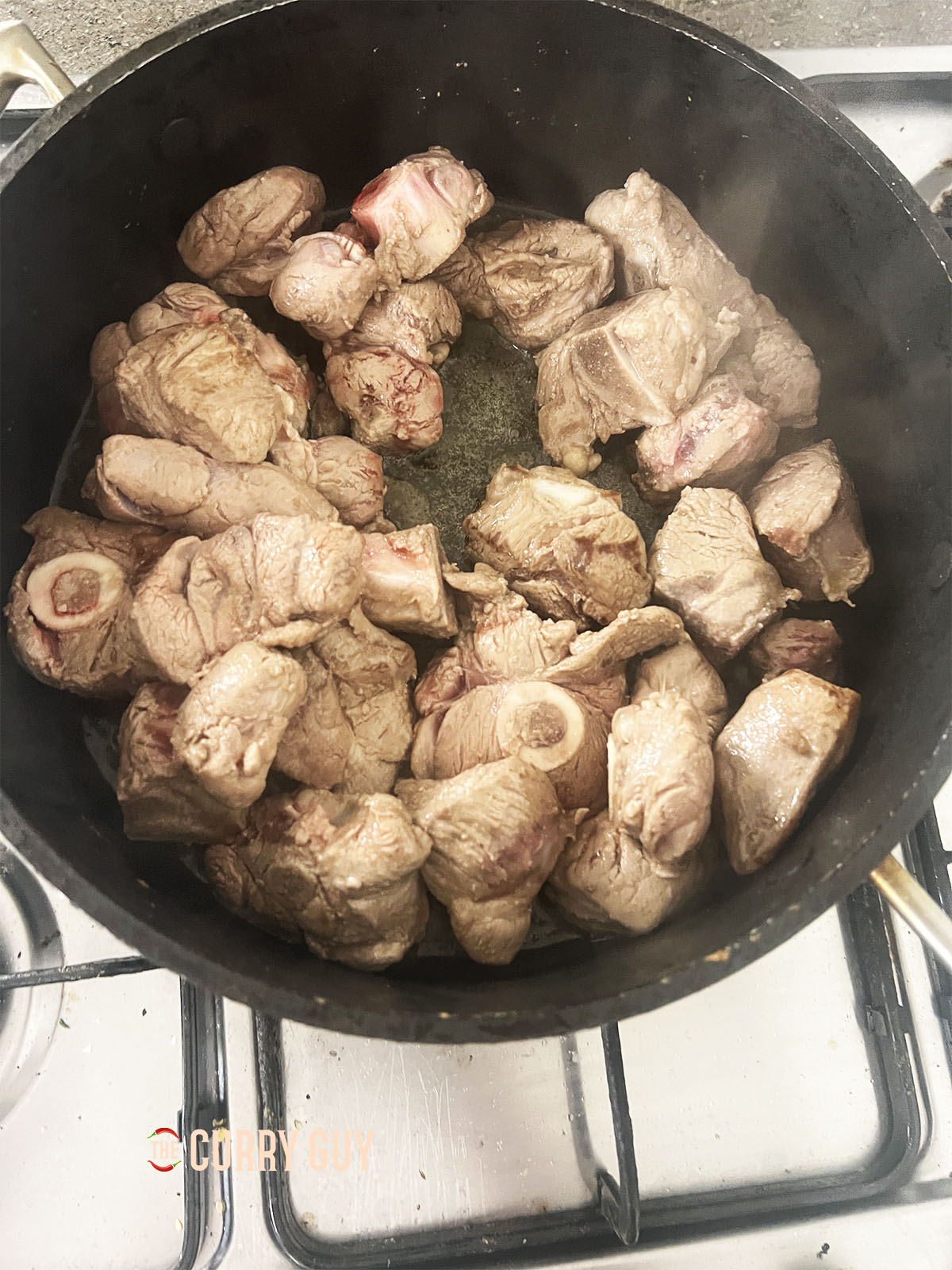 Browning the meat for the curry.