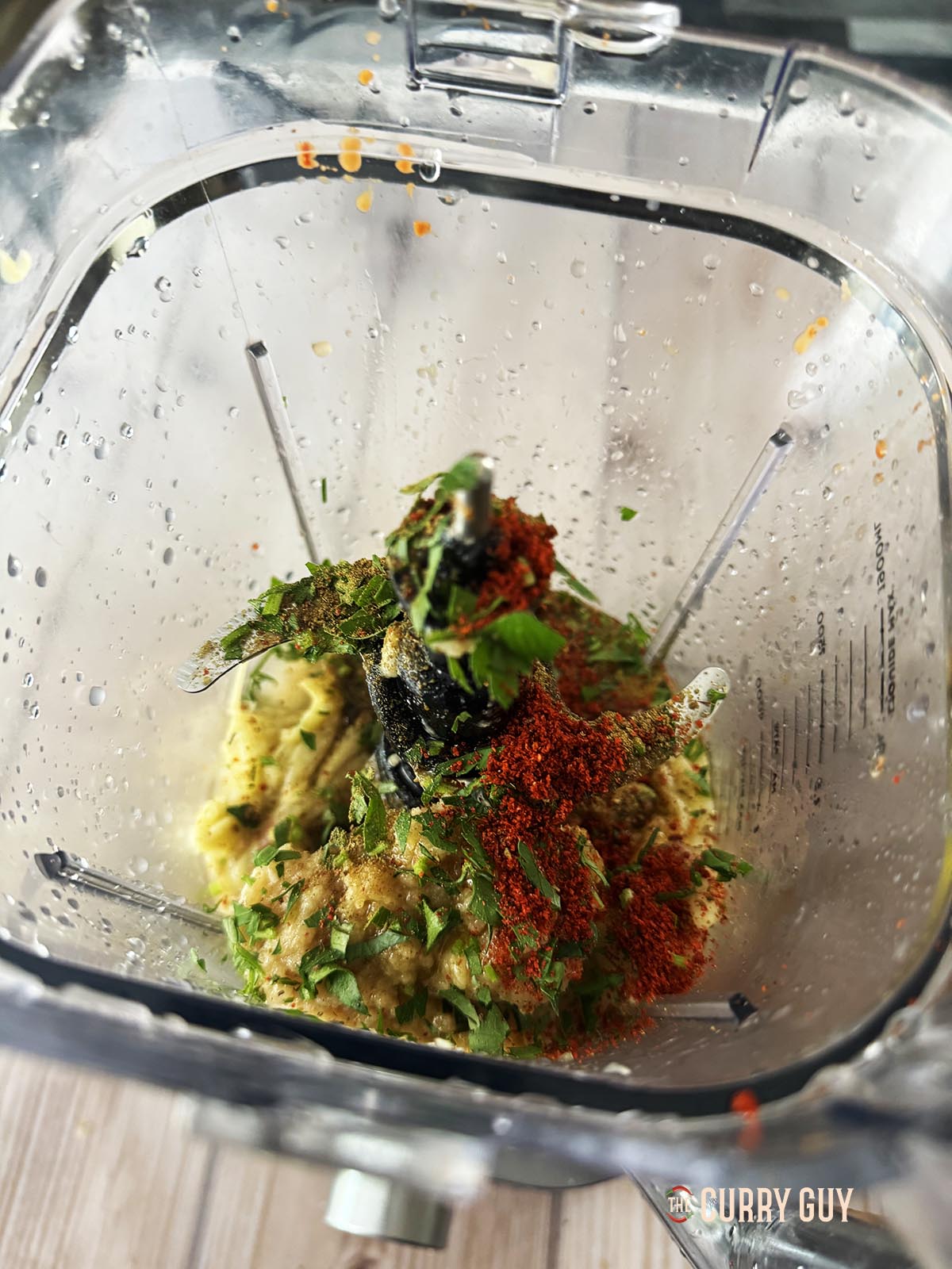 The ingredients for the recipe in a blender.