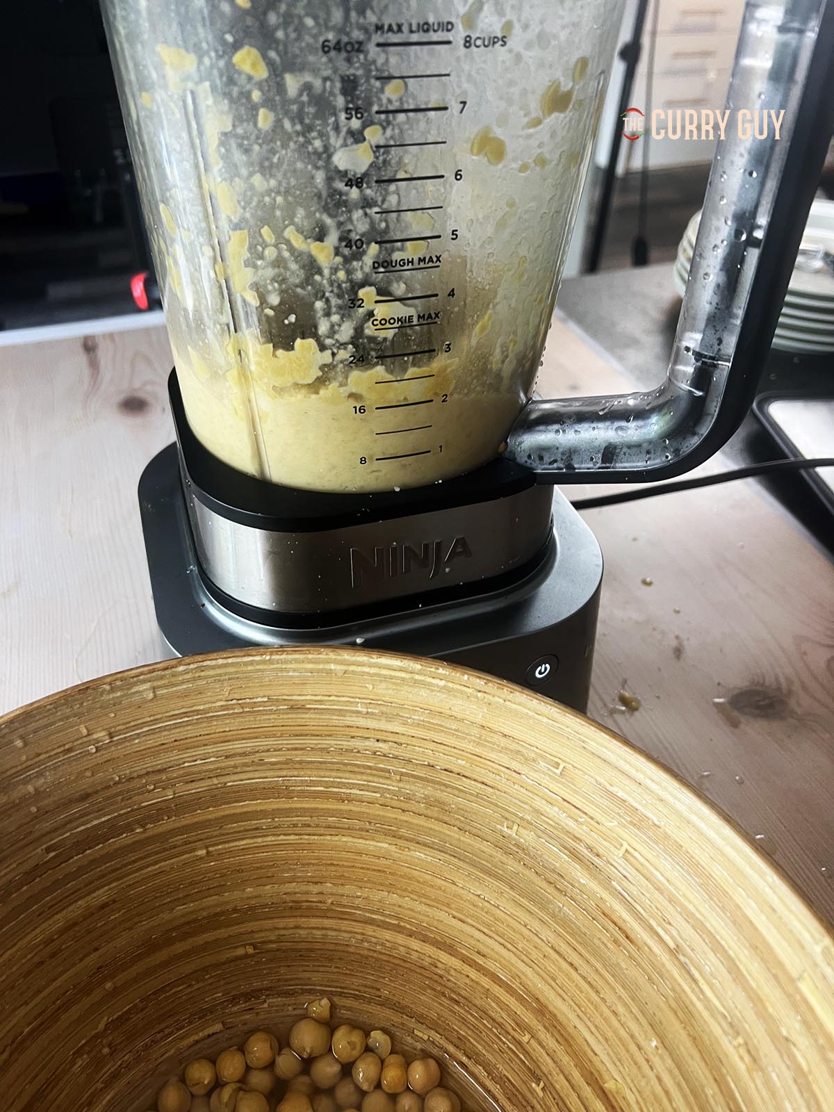 Adding half of the chickpeas and blending for about a minute.