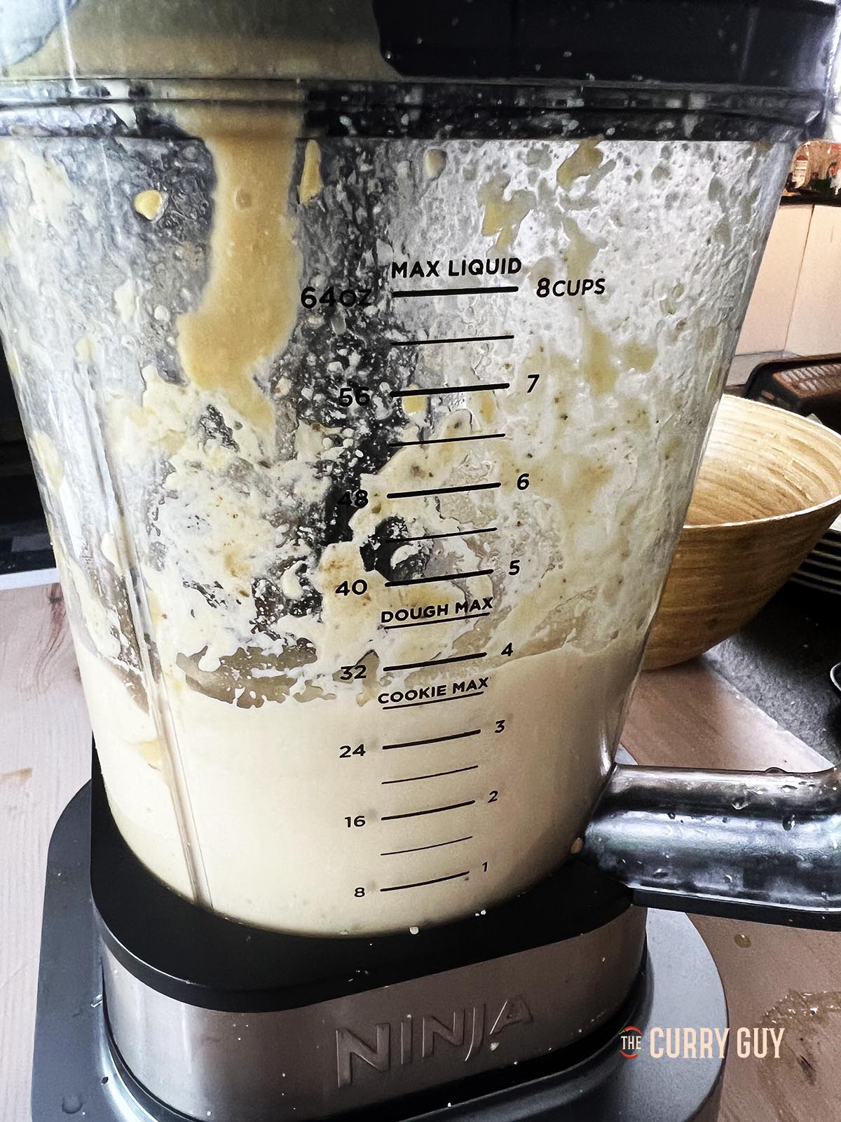 Blending the hummus until smooth.