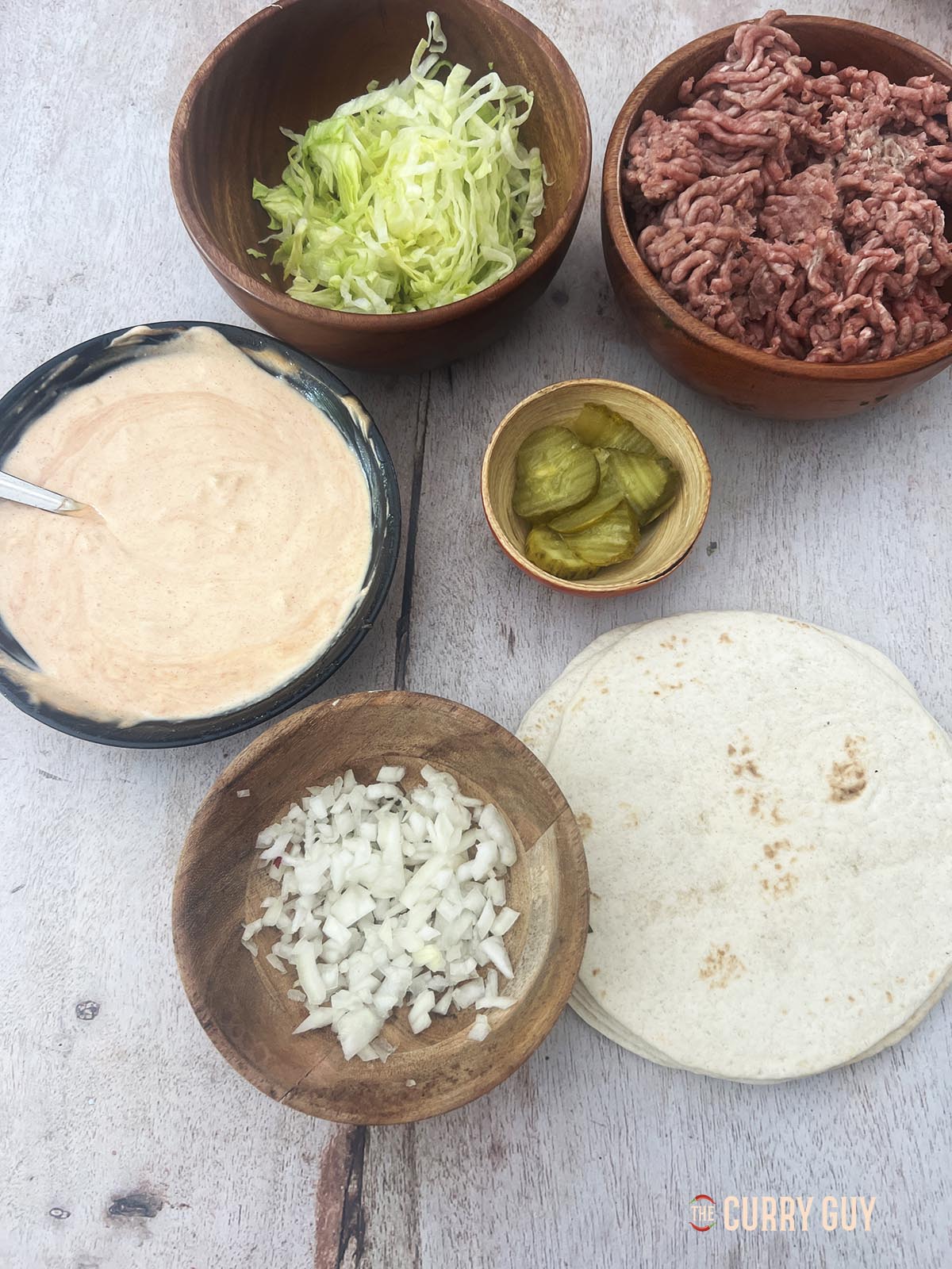 The ingredients for the recipe on a work surface.
