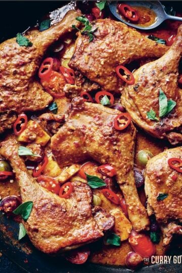 Red duck Thai curry in the pan it was cooked in.