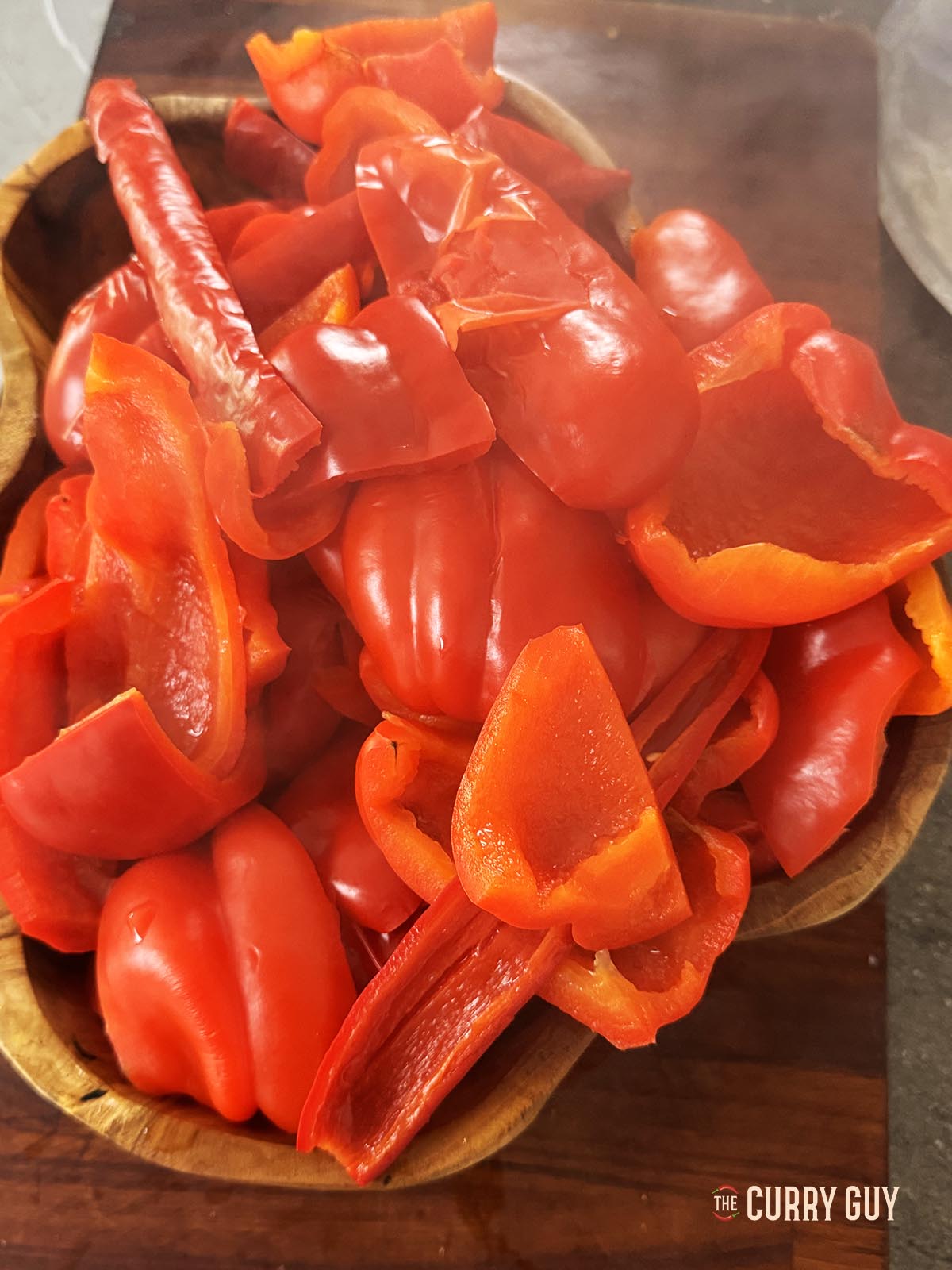 The cooked peppers in a large bowl. 