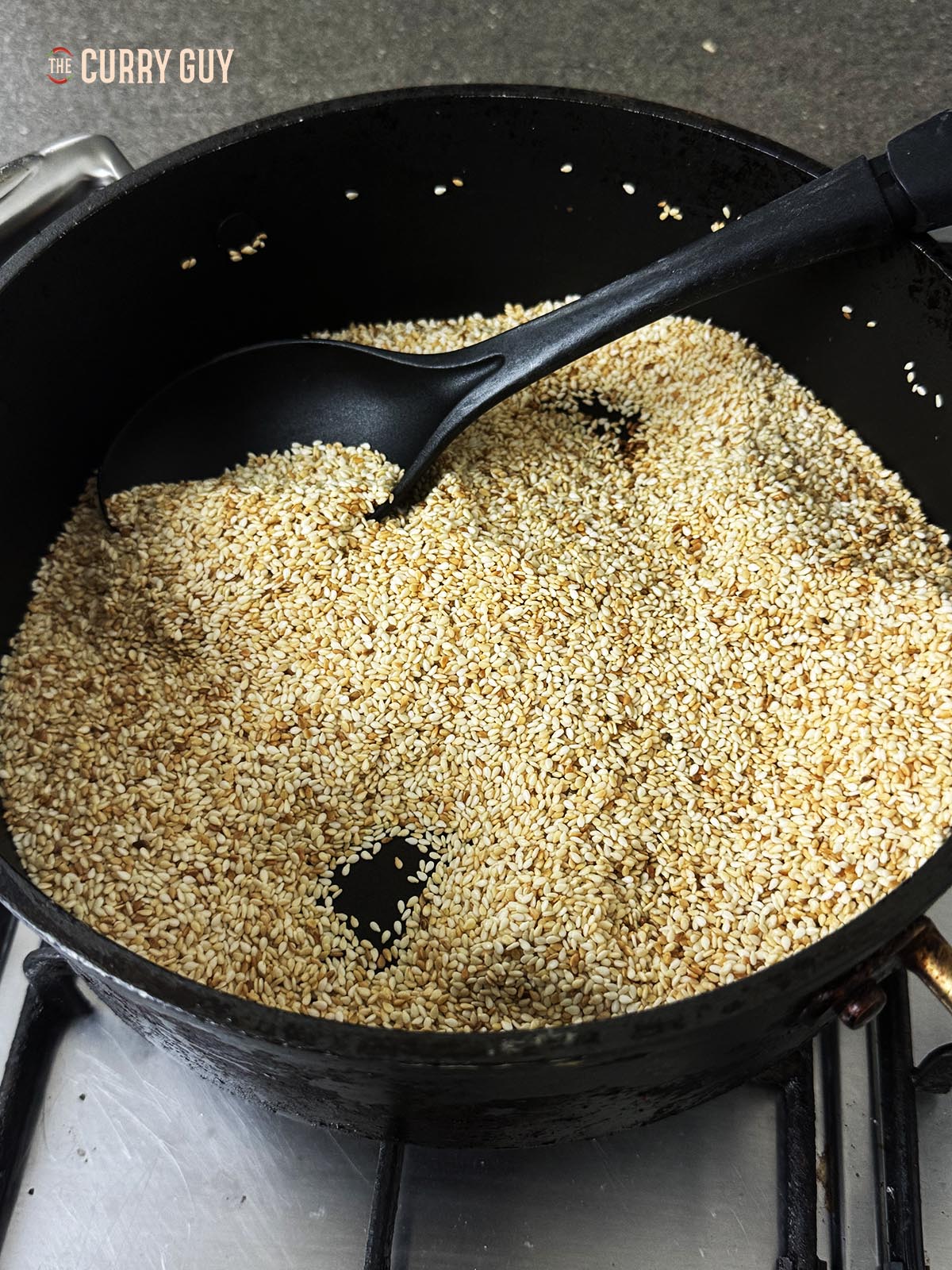 Toasting the sesame seeds until lightly browned.