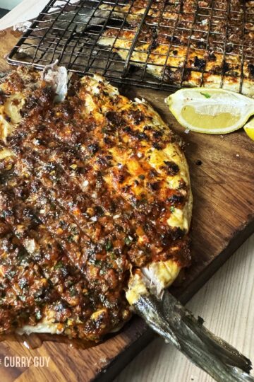 Mediterranean grilled fish on a serving platter.