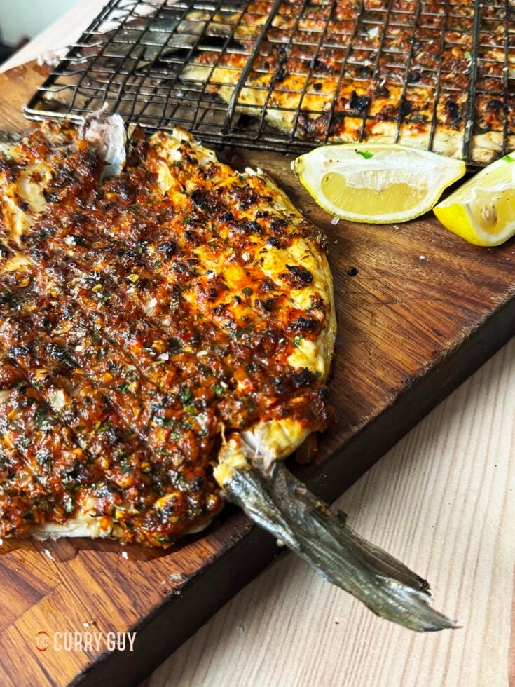 Mediterranean grilled fish on a serving platter.